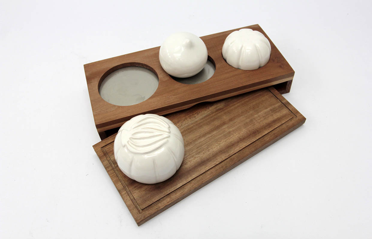 Productos Diferenciados en Cerámica Esmaltada y Madera